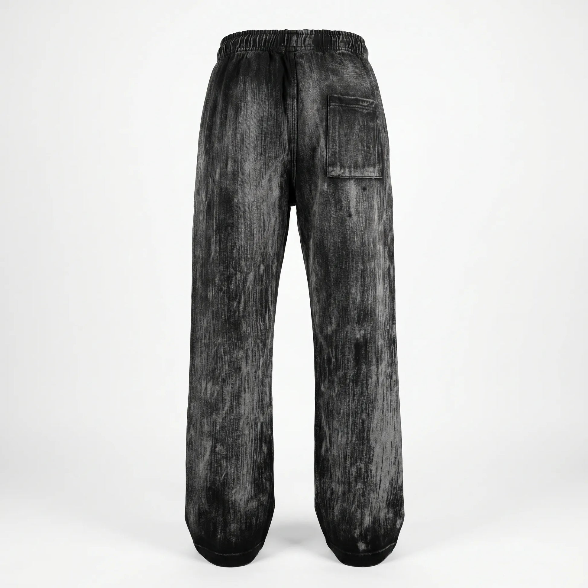 Black acid-wash jeans on a white background