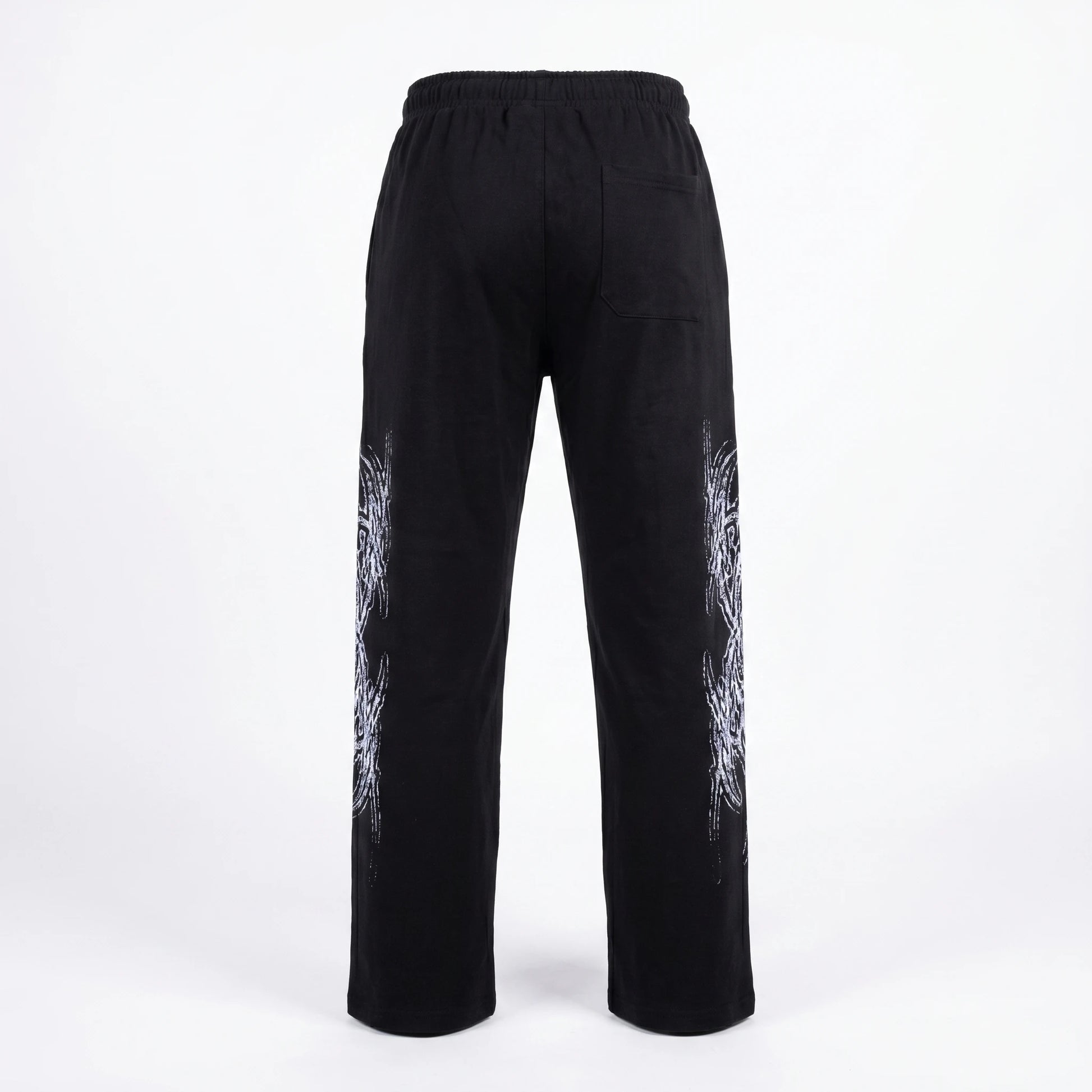 Black pants with white designs on a white background